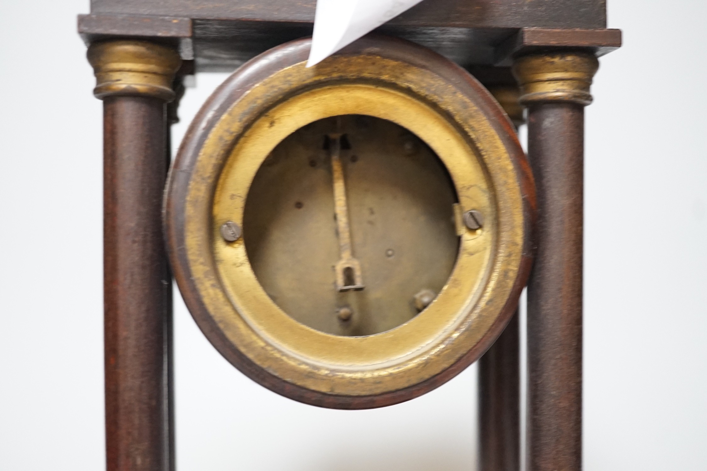 An Edwardian Portico-type mantel clock, 27cms high